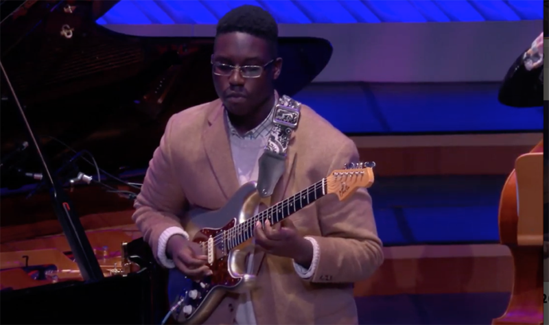 Screenshot of Jazz winner performing "Airplane" composed by Emmanuel Michael