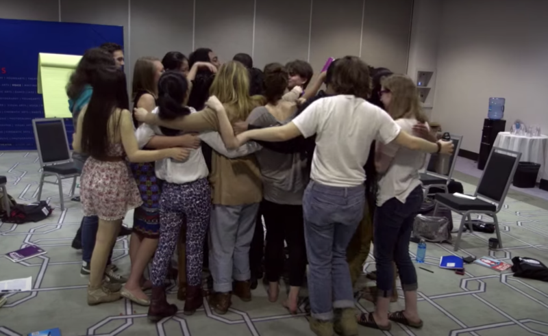 Screenshot of winners having a group hug during National YoungArts Week