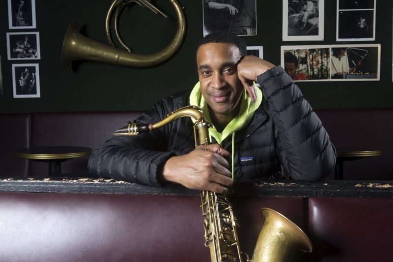 Javon Jackson seated with saxophone