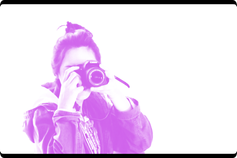 Young woman with Nikon camera
