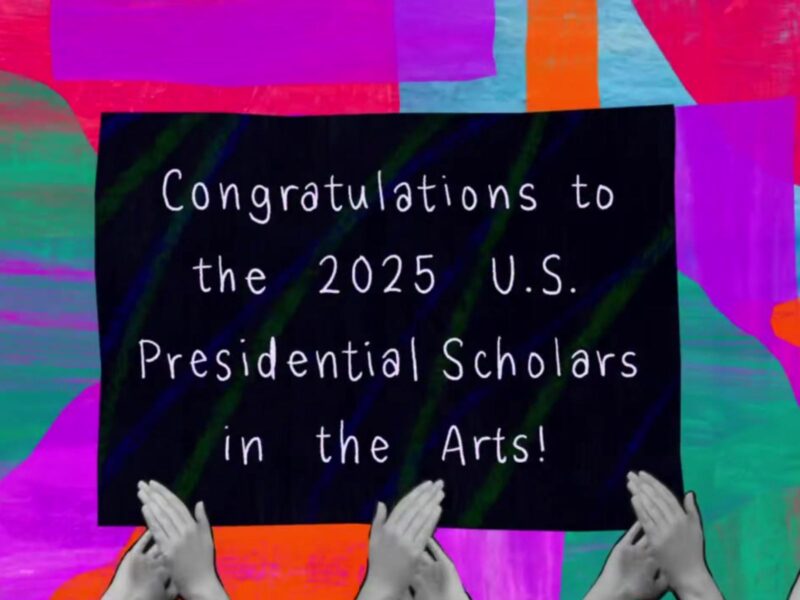 Animation still of hands clapping in front of a sign that reads "Congratulations to the 2025 U.S. Presidential Scholars in the Arts!"